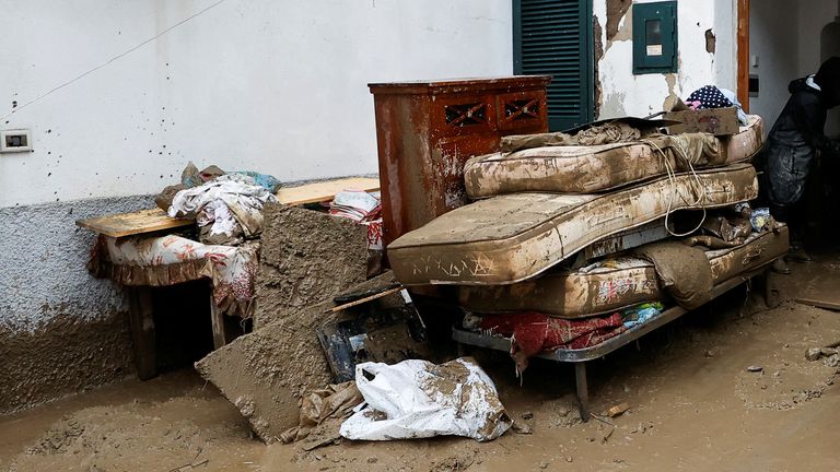 Ischia residents&#39; belongings covered in mud from the landslide