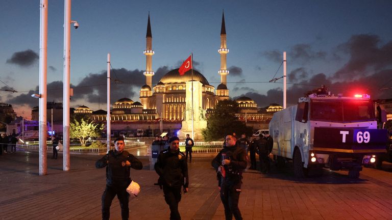 Members of the security forces stand on Taksim . square