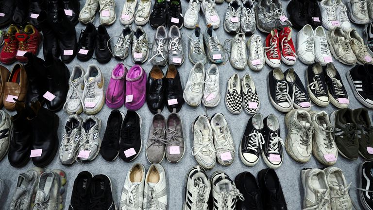Shoes belonging to victims are arranged at a gym, where recovered belongings of the victims of a crowd crush that happened during Halloween festivities are kept, in Seoul, South Korea, November 1, 2022. REUTERS/Kim Hong-Ji