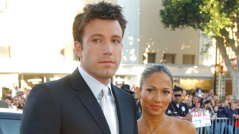 Ben Affleck, left, and Jennifer Lopez pose together at the premiere of the film "Daredevil," Sunday, Feb. 9, 2003, in Los Angeles. (Chris Pizzello via AP)