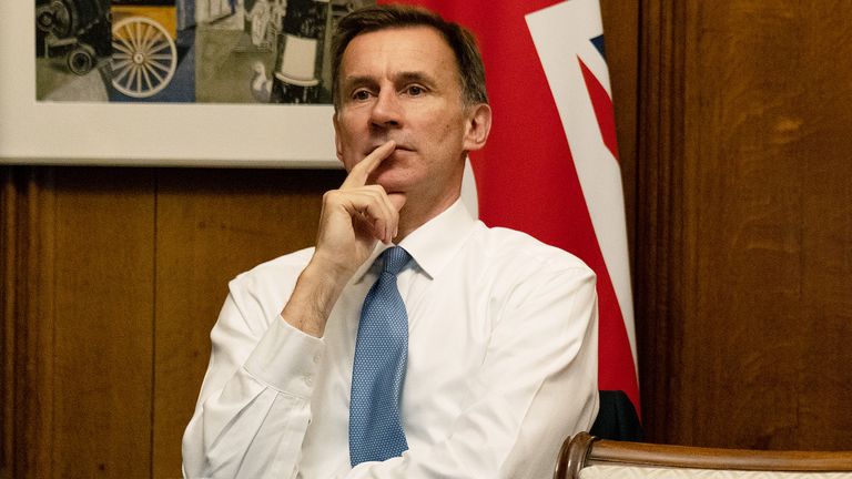 The Chancellor Jeremy Hunt works on his speech ahead of the Autumn Statement in his office in No11 Downing Street
