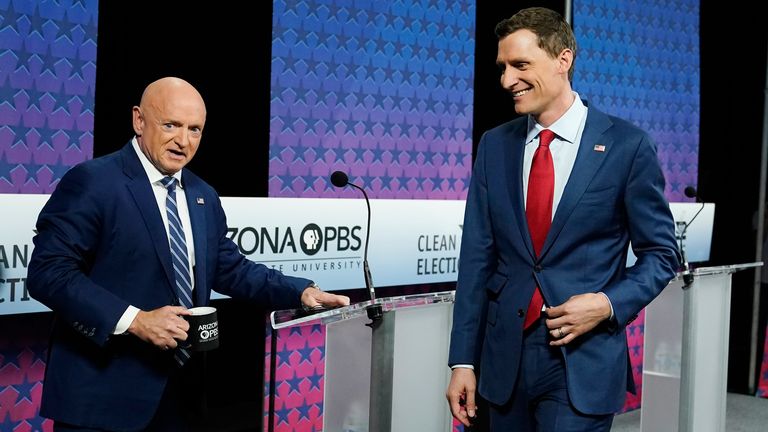 Arizona Democratic Sen. Mark Kelly, left, and his Republican challenger Blake Masters,. Pic: AP