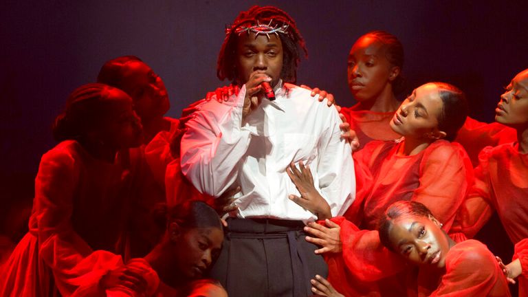 FILE - Kendrick Lamar performs at the Glastonbury Festival in Worthy Farm, Somerset, England, on June 26, 2022. Lamar was nominated for eight Grammy Awards on Tuesday. The 2023 Grammy Awards will air live Sunday, Feb. 5. (AP Photo/Scott Garfitt, File)