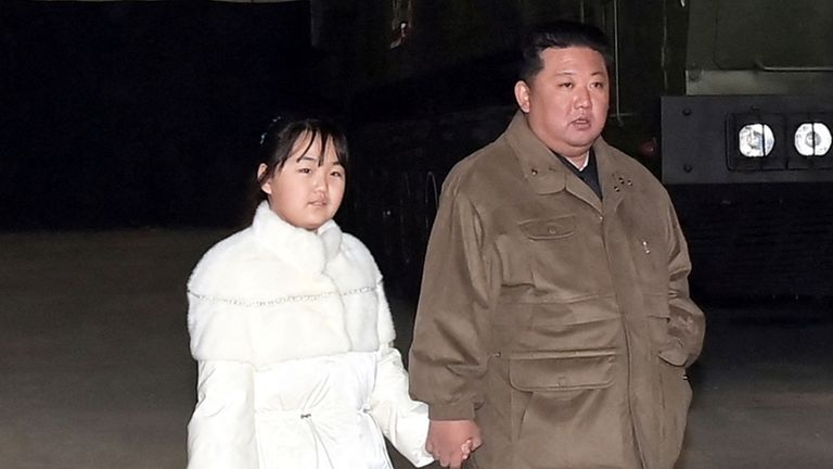 In this undated photo released by the Korean Central News Agency (KCNA) on November 19, 2022, North Korean leader Kim Jong Un and his daughter inspect an intercontinental ballistic missile (ICBM).  KCNA via REUTERS ATTENTION EDITORS - This image was provided by a third party. No third party sales. South Korea is out. There are no commercial or editorial sales in Korea. Reuters could not independently verify this image.