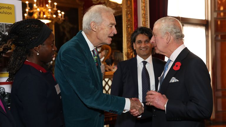 King Charles III speaks with guests, including Television presenter and journalist Jon Snow (second left), during a reception and ceremony commemorating the 50th anniversary of the Resettlement of British Asians from Uganda in the UK, at Buckingham Palace in London. Picture date: Wednesday November 2, 2022.
