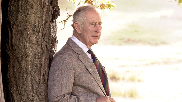 The King with an old oak tree in Windsor Great Park to mark his appointment as a Park Ranger.