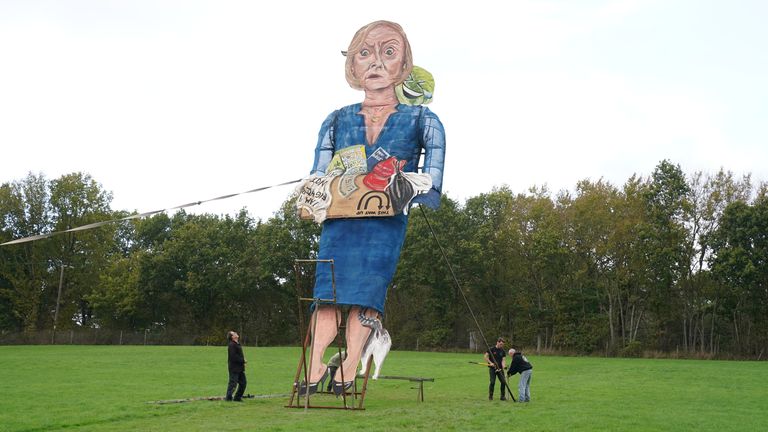 Members of the Edenbridge Bonfire Society unveil their latest celebrity Guy of former prime minister Liz Truss, at Breezehurst Farm Industrial Park, Edenbridge, Kent, ahead of the town&#39;s bonfire night display on Saturday. Edenbridge has been poking fun at infamous celebrities for more than 20 years, including past targets of Boris Johnson and Donald Trump. Picture date: Wednesday November 2, 2022.