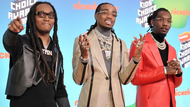 FILE - From left, Migos' Quavo and Offset appear at Nickelodeon Kids' Choice Awards on March 23, 2019 in Los Angeles. A representative confirmed the rapper was shot dead outside a Houston bowling alley after taking off. Take off, his real name is Kirsnick Khari Ball, 28.  (Photo by Richard Shotwell/Invision/AP, file)