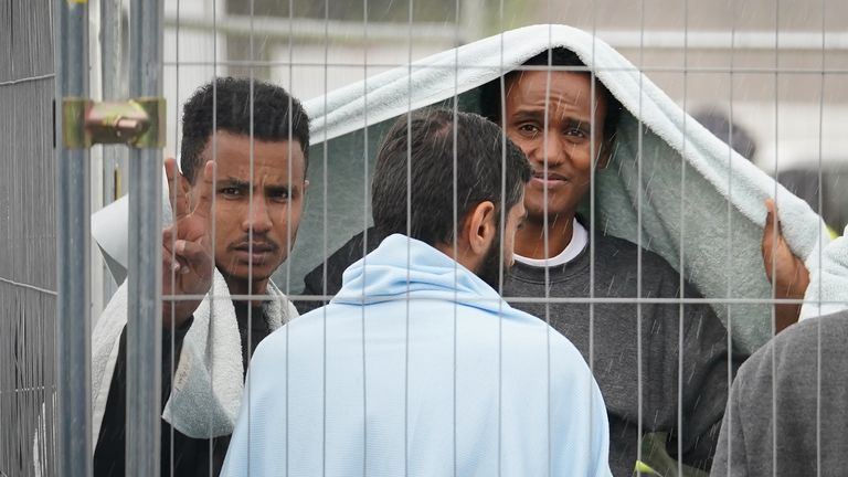 Men thought to be a migrants at Manston in Kent