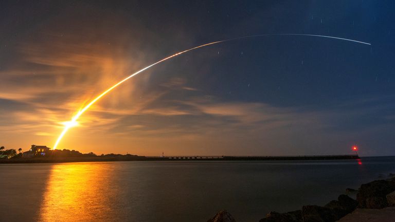 NASA&#39;s next-generation moon rocket, the Space Launch System (SLS) rocket with the Orion crew capsule, lifts off from launch complex 39-B on the unmanned Artemis 1 mission to the moon, seen from Sebastian, Florida, U.S. November 16, 2022. REUTERS/Joe Rimkus Jr.