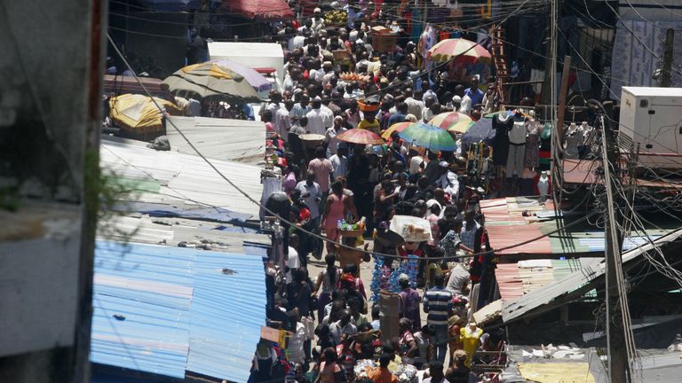 People crowd a street in a market on Lagos Island in Lagos, Nigeria AP file pic)