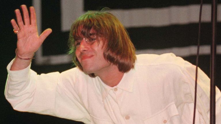 
Add to lightbox
Knebworth Oasis/8
Liam Gallagher waves at the audience during the Oasis concert at Knebworth in Hertfordshire tonight (Sat) Photo by Stefan Rousseau/PA.
Read less
Picture by: Stefan Rousseau/PA Archive/PA Images
Date taken: 10-Aug-1996