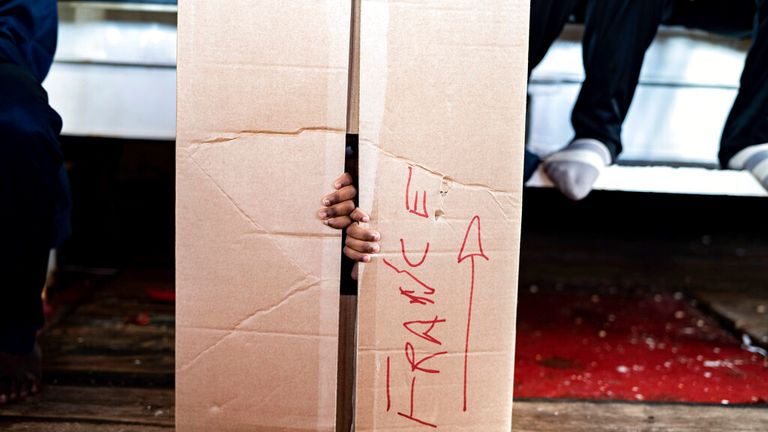 A child pictured playing in a box on Ocean Viking Pic: AP 