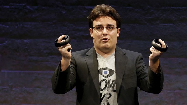 Oculus Founder Palmer Luckey displays an Oculus Touch input during an event in San Francisco, California June 11, 2015. Virtual reality company Oculus held the news conference ahead of the release of its consumer version of its head-mounted display. REUTERS/Robert Galbraith
