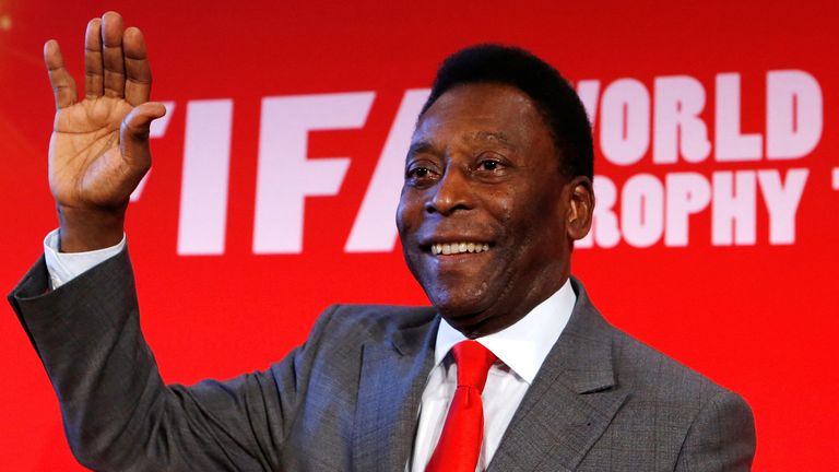 FILE PHOTO: Brazilian football great Pele attends a press conference to present the global FIFA World Cup "Tour of the trophy" in Paris on March 10, 2014. REUTERS/Gonzalo Fuentes/File Photo