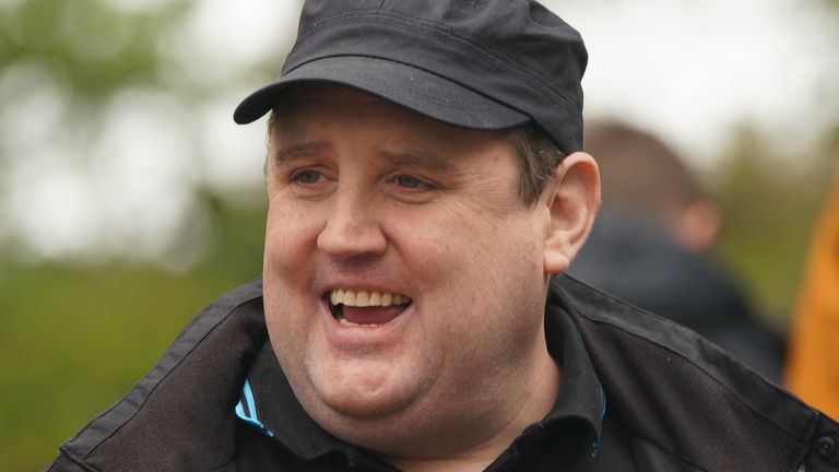 Comedian Peter Kay (centre) as he launches the Coulam Wheelyboat V17, a purpose-built fully wheelchair accessible powerboat at the Anderton Centre located on the banks of the Lower Rivington Reservoir near Bolton in Lancashire. Picture date: Saturday April 23, 2022.