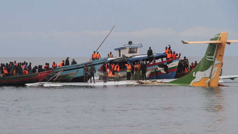 Rescuers attempt to recover the Precision Air passenger plane that crashed into Lake Victoria in Bukoba, Tanzania