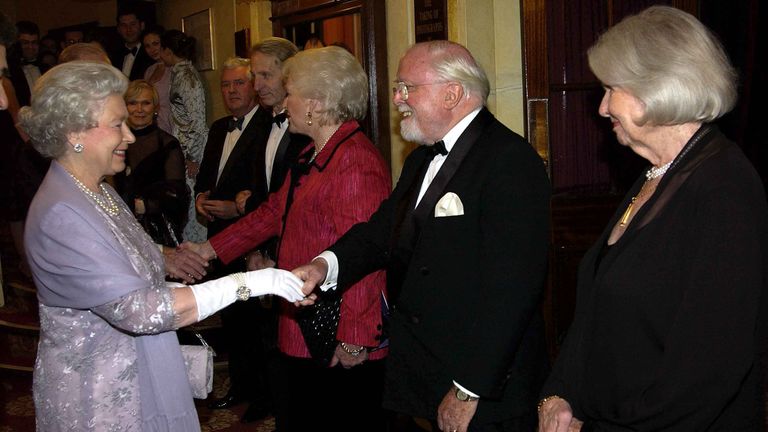 Queen Elizabeth II pays tribute to Lord and Lady Attenborough, who worked on the first Mousetrap, at the 50th anniversary celebrations in 2002