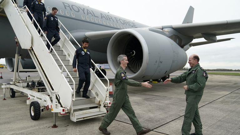 EMBARGOED TO 1800 FRIDAY NOVEMBER 18 Chief of the Air Staff, Air Chief Marshal Sir Mike Wigston (right) welcomes Flight Test Engineer Flight Lieutenant Nick Dehnel (2nd right) and the rest of the air crew as they disembark a Royal Air Force Voyager after it took part in the first flight in the UK using 100% Sustainable Aviation Fuel, a world-first using a large aircraft, at RAF Brize Norton, Oxfordshire. Picture date: Wednesday November 16, 2022.