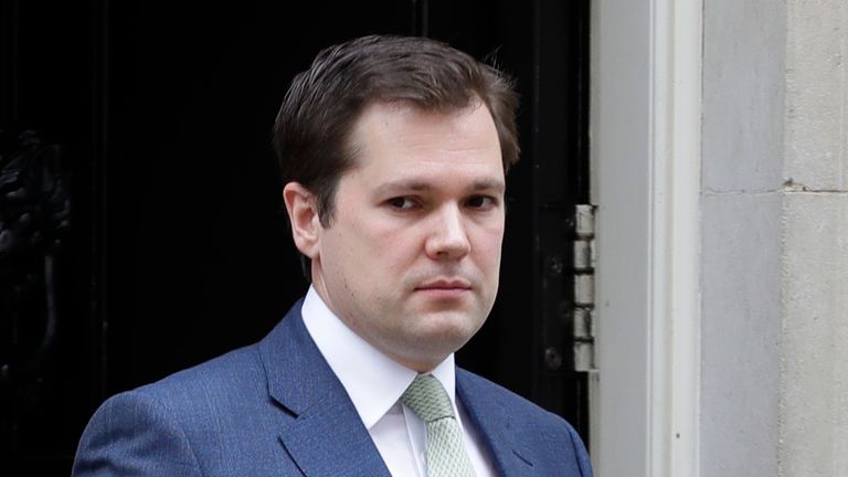 Britain&#39;s Housing Secretary Robert Jenrick leaves Downing Street after a meeting in London, Wednesday, March 18, 2020. For most people, the new coronavirus causes only mild or moderate symptoms, such as fever and cough. For some, especially older adults and people with existing health problems, it can cause more severe illness, including pneumonia. (AP Photo/Kirsty Wigglesworth)