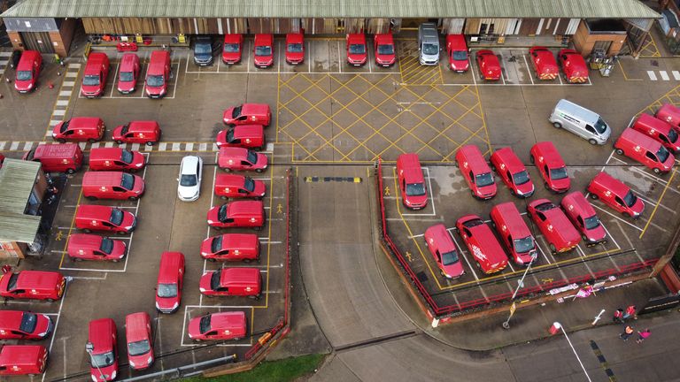 Royal Mail vehicles are parked at the Ashford Delivery Office in Ashford