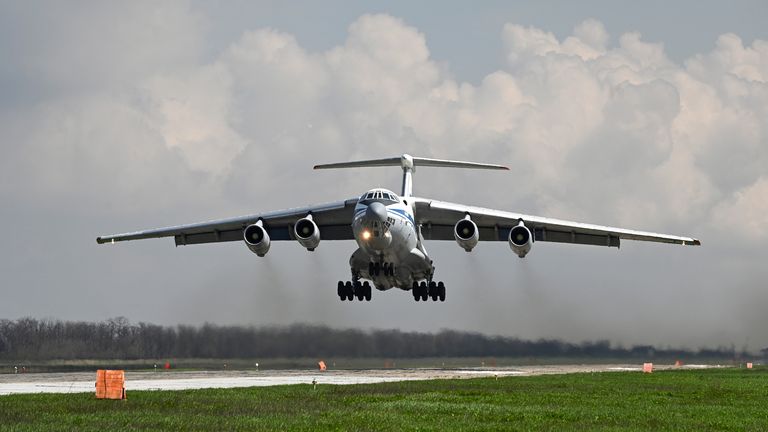 An Ilyushin Il-76 transport plane carrying Russian paratroopers takes off during drills at a military aerodrome in the Azov Sea port of Taganrog, Russia April 22, 2021. REUTERS/Stringer
