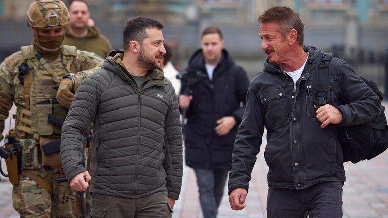 Ukrainian President Volodymyr Zelenskyy, left, walks with US actor Sean Penn after a meeting in Kyiv, Ukraine. Pic: Ukrainian Presidential Press Office/AP