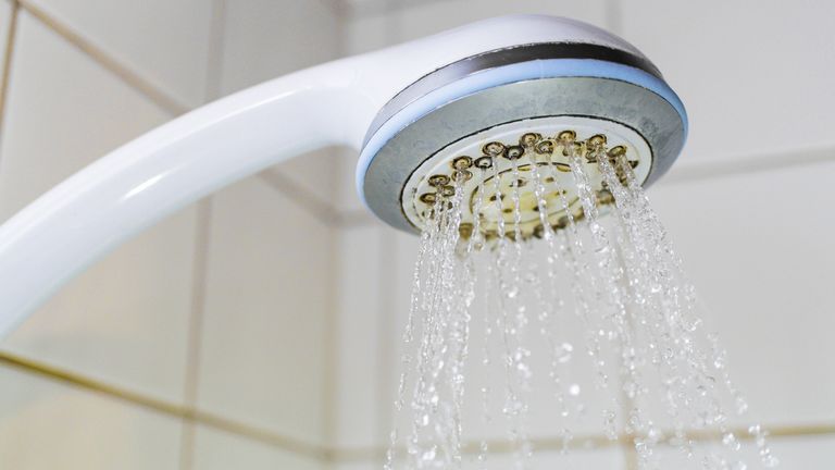Calcified shower head stock photo