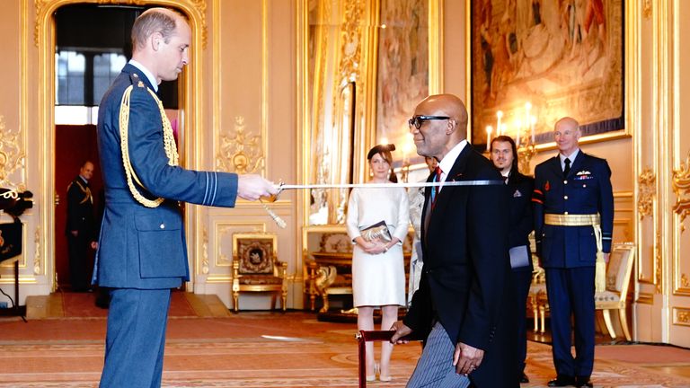 Sir Trevor Phillips is made a Knight Bachelor by the Prince of Wales, during an investiture ceremony at Windsor Castle, Berkshire. Picture date: Tuesday November 8, 2022.