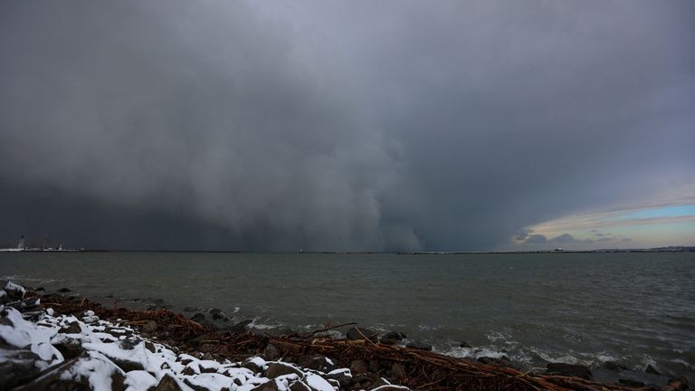 A cloud of snow is seen across Lake Erie on November 18, 2022, as extreme winter weather hits Buffalo, New York, United States. REUTERS/Lindsay DeDario