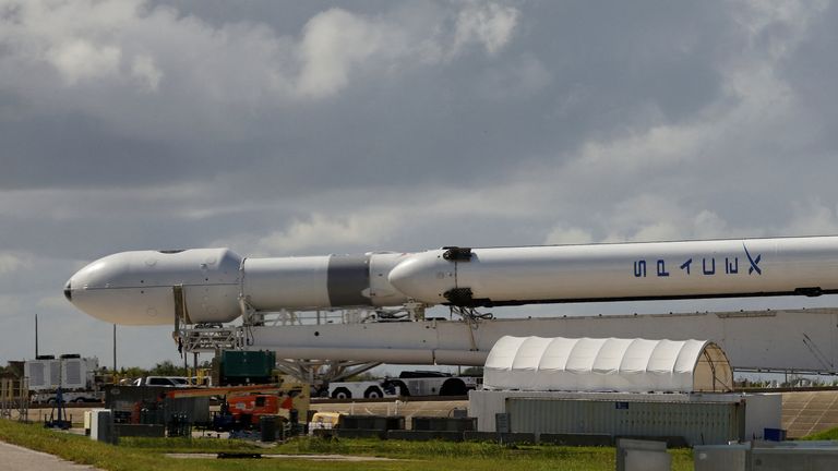 A SpaceX Falcon Heavy rocket with a long-delayed national security payload for the U.S. Space Force, rolls to launch pad 39A at NASA&#39;s Kennedy Space Center in Cape Canaveral