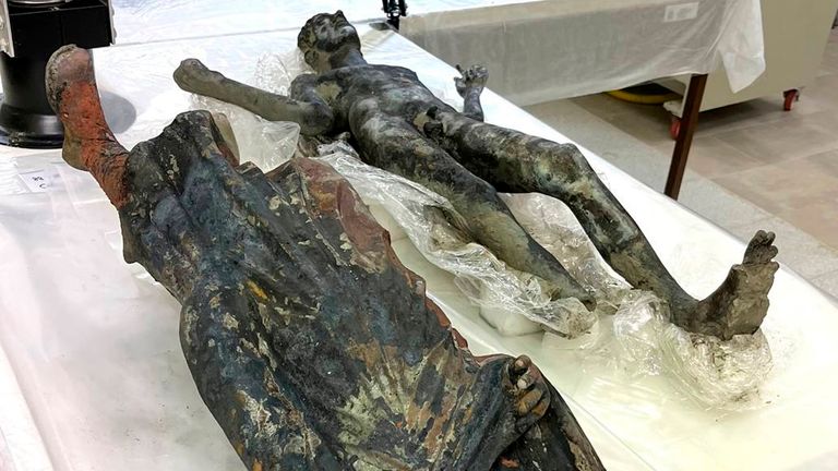 Finds, part of the discovery of two dozen well-preserved bronze statues from an ancient Tuscan thermal spring in San Casciano dei Bagni, central Italy, are seen in this undated photo made available by the Italian Culture Ministry, Thursday, Nov. 3, 2022. (Italian Culture Ministry via AP)