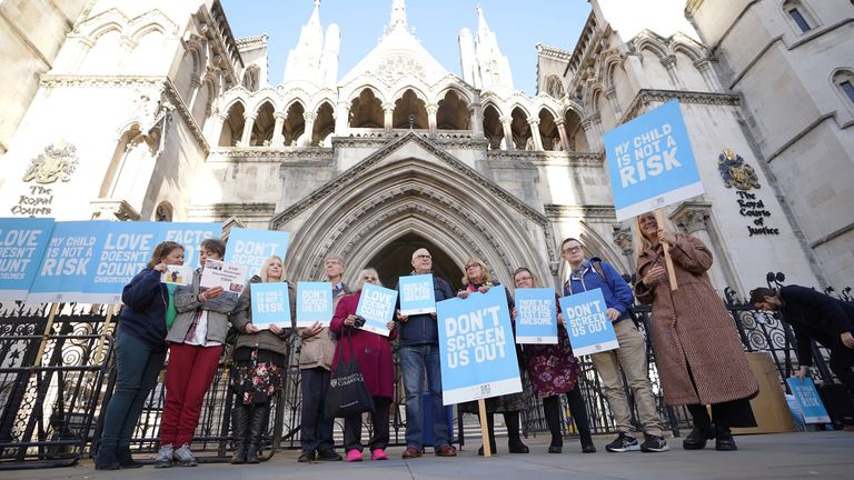 Supporters of Heidi Crotter and Mayer Lea Wilson outside the Royal Courts of Justice in central London