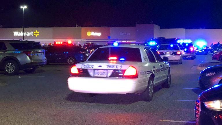 Virginia police respond to the scene of a fatal shooting at a Chesapeake Walmart. Image: WAVY-TV 10 via AP
