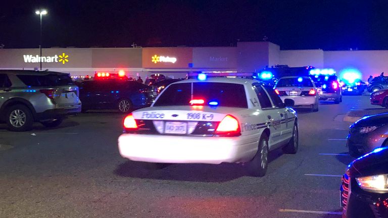 Virginia police respond to the scene of the fatal shooting at a Walmart in Chesapeake.  Image: WAVY-TV 10 via AP