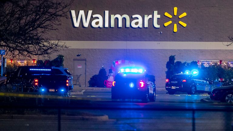 Police respond to the scene of a fatal shooting at a Walmart in Chesapeake, Virginia. Pic: Kendall Warner/The Virginian-Pilot via AP