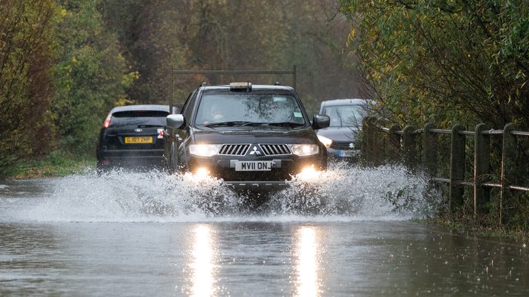 A motorist drives along a flooded road in Mountsorrel, Leicestershire. Motorists are being warned to stay off the roads as cars have become stuck in flood water caused by downpours and the UK prepares to suffer "miserable conditions" over the next two days. Picture date: Thursday November 17, 2022.

