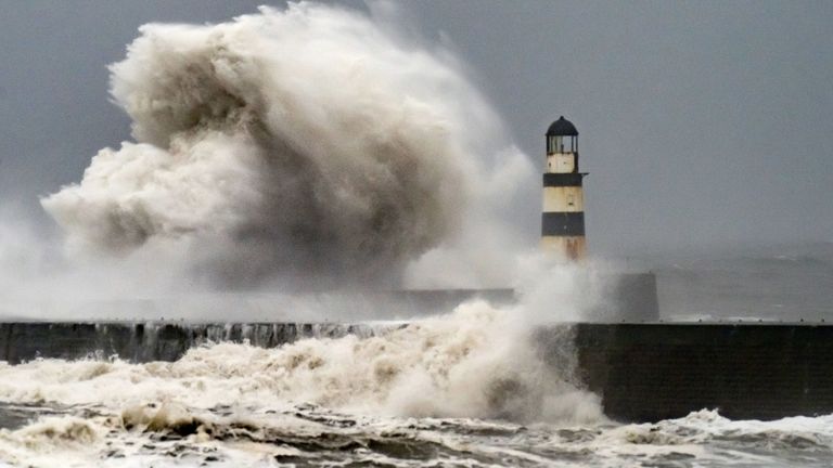 Waves crash against the lighthouse in Seaham Harbour, County Durham. File pic