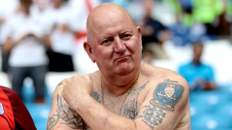 An England fan in the stands shows off his Sheffield Wednesday and England tattoos before the FIFA World Cup, Quarter Final match in 2018