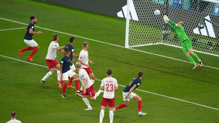Kasper Schmeichel makes a save to deny France&#39;s Adrien Rabiot