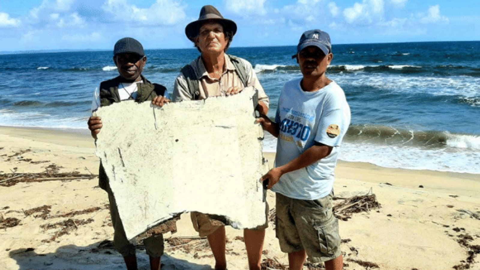 Flight MH370 debris suggests pilot lowered plane's landing gear and crashed deliberately, report says