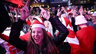 Fans wearing Christmas hats in London go wild as England are through to the World Cup quarter finals 