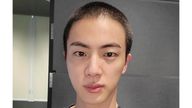 Jin of K-pop band BTS shows off freshly shaved hair on the K-pop social media platform Weverse
Pic:Weverse/AP