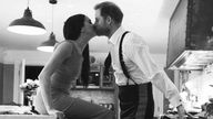 Duke and Duchess of Sussex kissing in a kitchen
PIC:Netflix