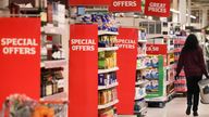 A employee walks inside a Sainsburys supermarket in Richmond, west London, Britain, June 27, 2022. Picture taken June 27, 2022. REUTERS/Henry Nicholls