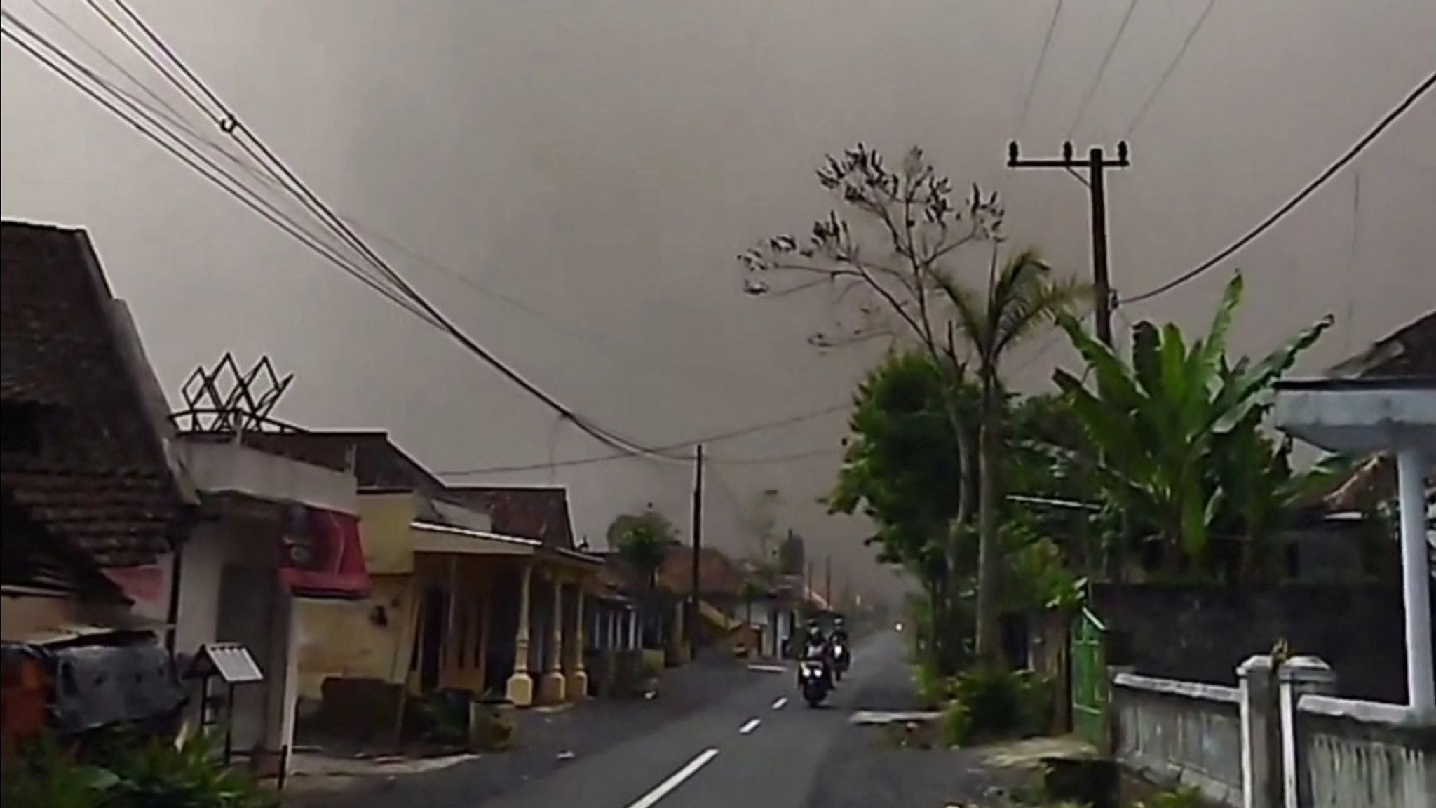 Indonesia volcano eruption spews lava rivers and 50,000ft high ash ...