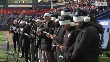 Bolton players attempt to break carol singing world record!