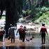 Nine dead after floods wash away worshippers during river 'baptism'