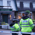 Woman killed in Merseyside pub shooting was shot in the head, police say - as search for gunman continues