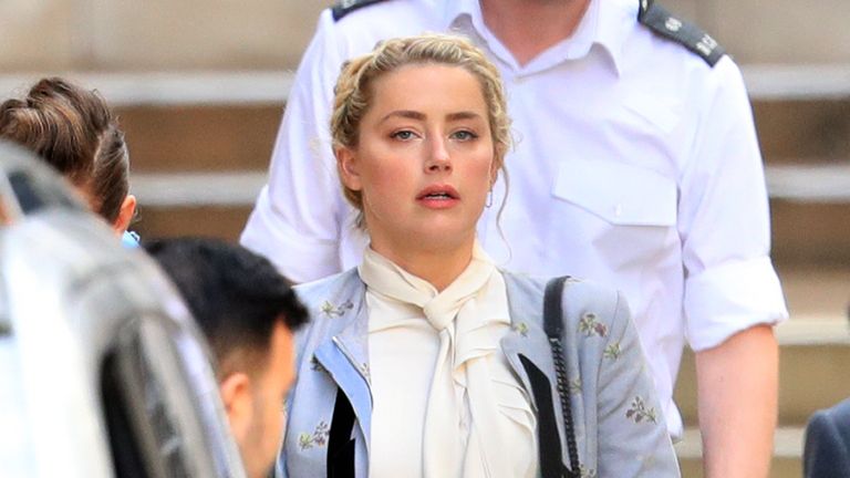 Actress Amber Heard has been hit after Johnny Depp's defamation trial against the publisher of The Sun and its executive editor Dan Wootton Heard leaves the High Court in London. Palestinian Authority photo. Image date: Tuesday, July 21, 2020.Depp, 57, is suing the tabloid's publisher, News Corp Newspapers (NGN), over an article calling him "beat wife" and mentioned "overwhelming evidence" He assaulted Ms Heard, 34, during their relationship, which he vehemently denies.